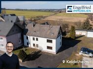 Geräumiges Ein- bis Zweifamilienhaus mit drei Garagen auf großem Grundstück nahe Simmern - Keidelheim