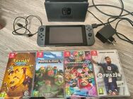 Nintendo Switch mit zusätzlichem Controller und 4 Spielen - Kindsbach