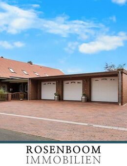 Wohnhaus mit zwei Wohneinheiten, einer Einliegerwohnung und einer Gewerbeeinheit in Reepsholt - Friedeburg