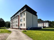 Familienfreundliche Eigentumswohnung mit Einbauküche, 2x Balkonen und 2x Garagen in Löberitz - Zörbig