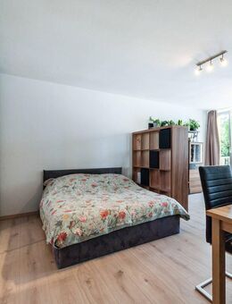 AIGNER - Ruhig gelegenes 1-Zimmer-Apartment mit Balkon in Schwabing - München