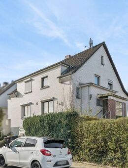 Charmante Doppelhaushälfte mit Garten, Kaminofen und Ausbaupotenzial in Velbert-Neviges - Velbert