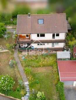 Zweifamilienhaus mit Doppelgarage und ausgebautem Dachgeschoss - Gaildorf