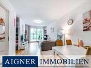 AIGNER - Moderne, möblierte 1,5-Erdgeschosswohnung mit Südterrasse und optimaler Anbindung - München