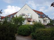 Schöne und helle Maisonettewohnung mit Galerie und Tiefgaragenstellplatz in ruhiger und grüner Lage. - Coswig