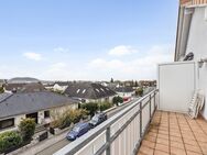 Helle Dachgeschosswohnung mit Balkon in ruhiger Lage - Buseck