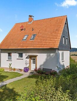 Gemütliches 2-Familienhaus mit großem Grundstück und traumhaften Fernblick über die Felder auf den Dörnberg - Habichtswald
