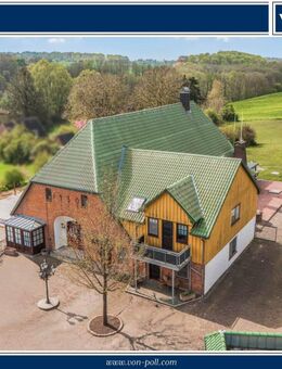 Großzügiges Mehrfamilienhaus mit Garten, Wintergarten und Garagen - Hohenfelde (Landkreis Plön)