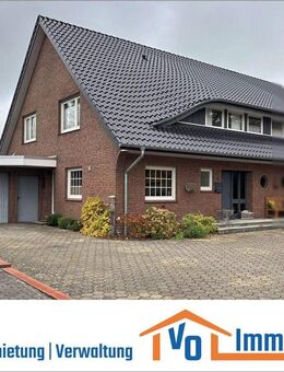 Doppelhaushälfte mit freiem Blick auf Felder und Wiesen in Zentrumslage von Uplengen-Remels - Uplengen