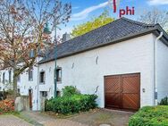 PHI AACHEN - Gepflegter Einfamilientraum mit großzügigem Garten und Garage in Aachen-Laurensberg! - Aachen