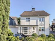 Freistehendes Einfamilienhaus mit Doppelgarage mit Hauszugang * Wohnliche-Nutzfläche 187 m² * Garten- und Dachterrass... - Burscheid