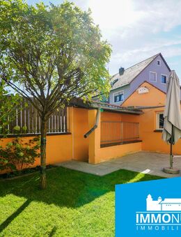 Wie für Familien gemacht: Haus mit Innenhof, Hobbybereich und Garten - Fürth