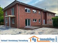 Energetisch hochwertig: Oberwohnung mit Balkon und einer Einbauküche in zentraler Lage von Remels - Uplengen