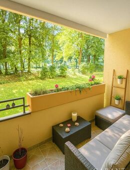 Gepflegte 3 Zimmer-Hochparterre-Wohnung mit Balkon und Tiefgaragenstellplatz - Augsburg