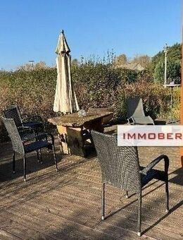 IMMOBERLIN.DE - Angenehmes Haus mit Sonnenterrassen, Loggien & Garage auf großem Grundstück in ländlicher Lage - Kremmen