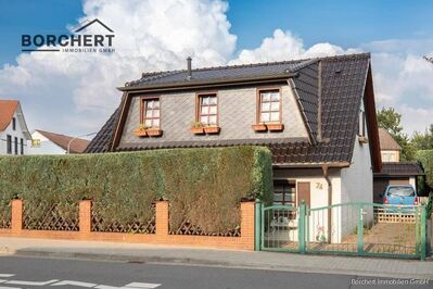 Zentral gelegenes Haus mit lichtdurchflutetem Wintergarten in Ellerbek!