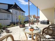 BERK Immobilien - Charmante 2-Zimmer-ETW mit großzügiger Terasse, Gartenanteil, Garage + 100m² Dachboden - Stockstadt (Main)