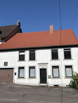 Solides Ein- bis Zweifamilienhaus in zentraler Lage von Großrosseln mit Gestaltungspotenzial - Großrosseln