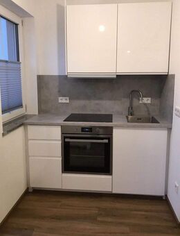 Erstbezug nach Renovierung: 2-Zimmer-Wohnung mit Terrasse (Stellplatz optional) - Pfatter