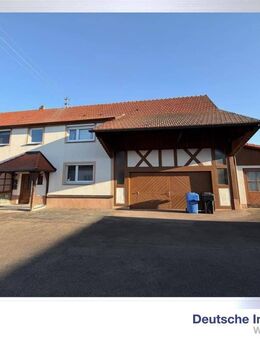 3-Familienhaus mit Garagen, großem Anbau mit Ausbaumöglichkeit und schönem Garten in Bisingen - Bisingen