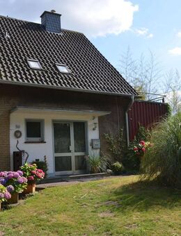 Teilrenoviertes Einfamilienhaus mit Wintergarten und weitläufigem Garten in Randlage von Moers - Moers