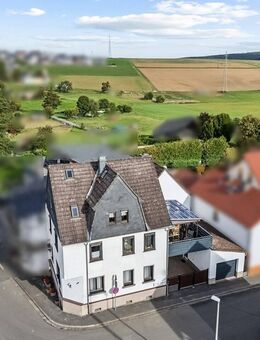 Einfamilienhaus mit ELW im Teileigentum in ruhiger Ortsrandlage - Waldems