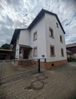 Ruhig gelegenes schnuckeliges Einfamilienhaus mit Werkstatt und Garage mit Renovierungsbedarf - Rheinau