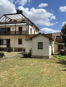 Großzügiges Mehrgenerationenhaus mit weitläufigem Garten und Garage! - Karben