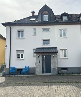 Reihenhaus mit DG- Wohnung