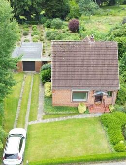 Zuhause gesucht? Einfamilienhaus auf großem Grundstück mit Garage und Flair wartet auf Dich - Oldendorf (Schleswig-Holstein)