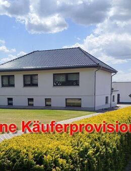 Einfamilienhaus mit Gartenhaus, Garage und Carport - Heinrichswalde
