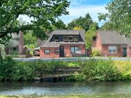 komplett renovierte Erdgeschosswohnung in Wiesmoor Ortsteil Hinrichsfehn mit Kanallage zu vermieten. - Wiesmoor