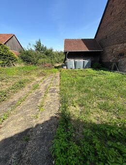 Baugrundstück plus Zweifamilienhaus mit Ausbaureserve und Werkstatt - Mömbris