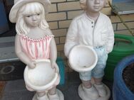 2 massive Figuren - Peine