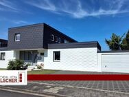 Gepflegtes Zweifamilienhaus mit kleiner Einliegerwohnung, 4 Garagen und Garten in Baesweiler - Baesweiler