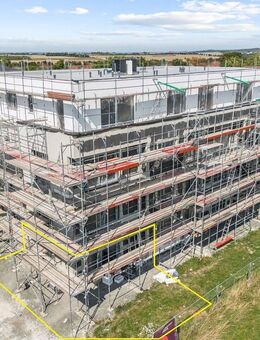 Im Erstbezug - KfW 55-Standard: Helle 3-Zimmer-Wohnung mit großem Gartenanteil und 2 Stellplätzen - Ober-Mörlen