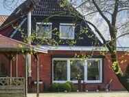Preisreduktion: Gepflegtes Einfamilienhaus mit sonnigem Garten und großem Hof in Feldranlage - Bothkamp