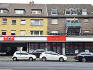 Voll vermietetes Wohn- und Geschäftshaus mit Stellplätzen und Garagen - Mönchengladbach
