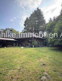 Freistehender Winkel-Bungalow mit Einliegerwohnung und Garagen in begehrter Lage von Wassenberg - Wassenberg