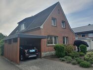 freistehendes Einfamilienwohnhaus mit Garage und Carport auf großem Grundstück in Herzebrock zu verkaufen - Herzebrock-Clarholz