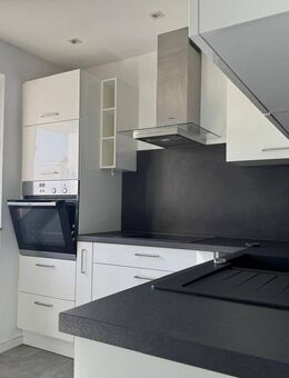 TOP modernisierte 2,5 Zi. Whg. mit Küche, TG Stellplatz, Balkon, Keller u. Einbauschränke - Oberteuringen