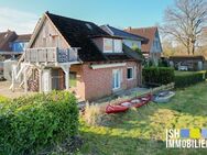 Einfamilienhaus mit Einliegerwohnung und Blick in die Schwingewiesen - Stade (Hansestadt)