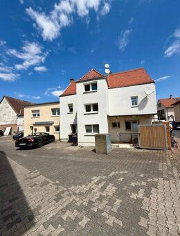 Vielseitig nutzbares Einfamilienhaus mit Anbau in zentraler Lage von Okarben - Karben