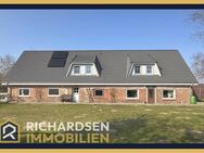 Modernisiertes Einfamilienhaus mit Einliegerwohnung in ruhiger Ortsrandlage in 25923 Uphusum - Uphusum