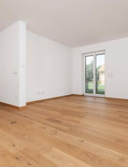 Neubau: Gemütliche 3-Zimmer-Wohnung mit großzügiger Terrasse und Gartenanteil im Erdgeschoss - Plößberg