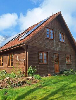 Zauberhaftes Holzbohlenhaus mit Einliegerwohnung in Mohrkirch - Mohrkirch