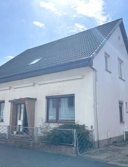 PURNHAGEN-IMMOBILIEN - Freistehendes Einfamilienhaus mit Garage in ruhiger Lage von Bremen-Blumenthal! - Bremen