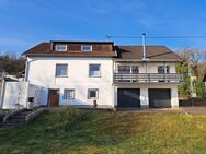 Freistehendes Einfamilienhaus mit Anbau/Einliegerwohnung in ruhiger Lage und mit Fernblick in Merzig-Fitten - Merzig