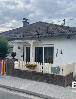 Großzügiger Walmdachbungalow mit Garten und Garage - Wehrheim