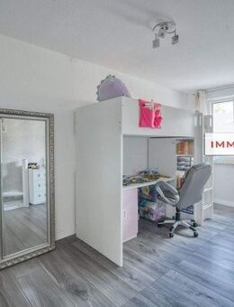 IMMOBERLIN.DE - Adrettes Reihenendhaus mit Südterrasse, Sonnengarten & Garage in familienfreundlicher Lage - Berlin